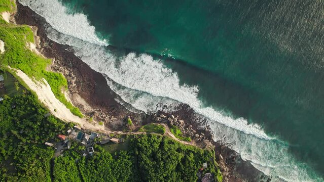Huge oceanic waves crashing steep cliffs at Uluwatu, Bali, Indonesia.
DJI Mavic drone beautiful relaxing aerial footage 