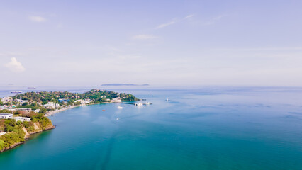 Aerial view of blue water surface background and sun reflection. aerial view of a flying drone...