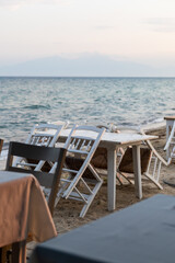 Fototapeta na wymiar empty traditional seaside restaurant tables