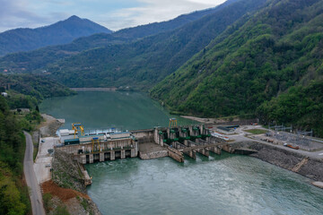 Fototapeta na wymiar Dam of Kirnati Hydroelectric power plant on Chorokh river, Georgia, aerial drone view