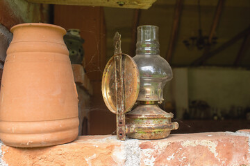 Antique petroleum lamp in an old barn.High quality photo.