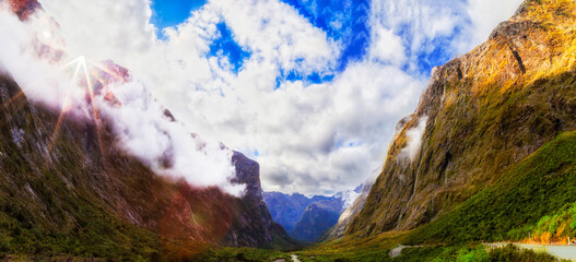 NZ Milford Sound vale sun sky
