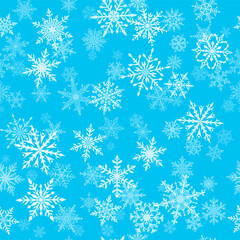 Christmas seamless pattern of beautiful complex snowflakes in light blue and white colors. Winter background with falling snow