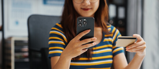 Excited Asian female student doing Online MBA and Business Degree Programs and learn indian...