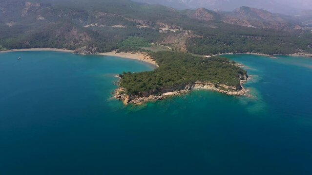 Aerial 4k footage of the natural wonder bay where the ancient city of Antalya Phaselis was founded