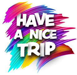 Have a nice trip paper word sign with colorful spectrum paint brush strokes over white. Vector illustration.