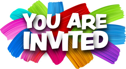You are invited paper word sign with colorful spectrum paint brush strokes over white. Vector illustration.