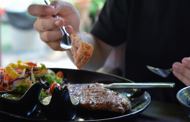 Steak and salad on plate popular food