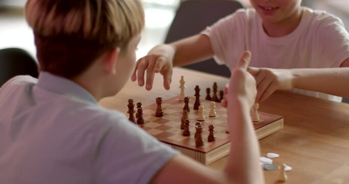 Children Engaging in Chess at School Competitions. Teenagers Brain development no face Move is decision fraught with consequences, requiring to foresee consequences choices, consider tactics opponents