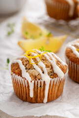 Lemon zucchini muffins with thyme and cream cheese glaze
