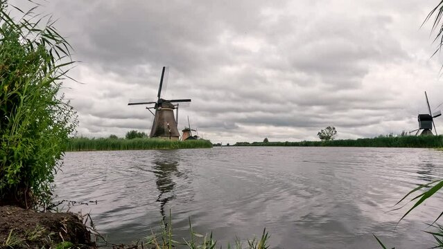 Iconic and historical wooden Dutch windmills and canal system. Built in 1738 and 1740, to keep water out of the low-lying areas. They have been a UNESCO World Heritage Site since 1997. 