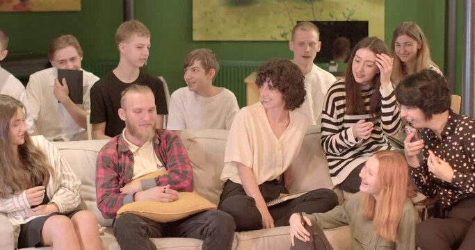 Conscious Presence Participants learn to be in the present moment, paying attention to their feelings and environment. A group of people are talking to each other exchanging emotions in a company.