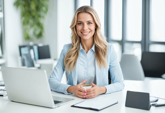 Beautiful happy woman sitting confidently in office and looking at camera