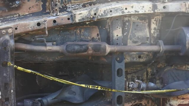 Pan Shot of car caught on fire as a fuel oil storage tank exploded in Plumpang, North Jakarta, Indonesia