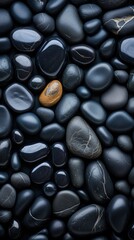 Obraz na płótnie Canvas close-up vertical background glossy black wet pebbles. Macro, pebble background. 