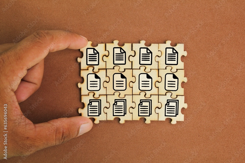 Poster wooden puzzle with stacked file icons. concept document management system or dms. concept concept do