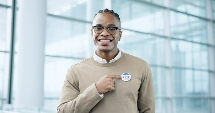 Smile, vote and a black man pointing to a badge in support of freedom, democracy or choice in politics. Portrait, face and proud of his choice, decision or selection of political party in an election