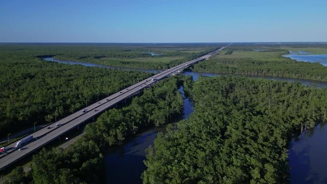 highway road aerial view. bridge over the river