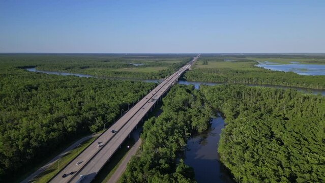 highway road aerial view. bridge over the river