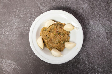 Rosun Bhorta or roshun vorta lassan and garlic bharta served in dish isolated on background top view of bangladesh food