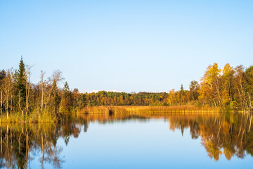 Tranquility by a lake with autumn colors