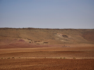 Dry and arid deserted region in a desert landscape in the mountains of Morocco.