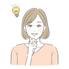 顎に手を置いて笑顔でひらめく女性