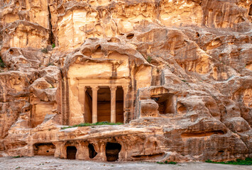 Temple above cave rooms, carved into sandstone in Siq Al-Barid, Little Petra, Jordan.
