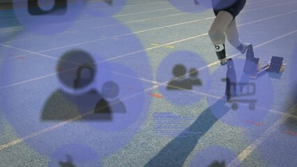 Animation of icons disable biracial athlete running with prosthetics legs on running track - Powered by Adobe