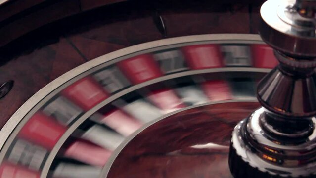 Casino spinning roulette and falling lucky number. Roulette in the casino. The lucky number drops out