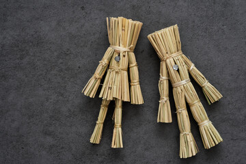 couple halloween curse straw doll Japanese wara ningyo voodoo dark magic background. halloween couple curse straw doll Japanese wara ningyo voodoo dark magic dark background. curse straw 