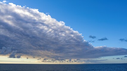 Colorful cloudy sky at sunset. Gradient color. Sky texture, abstract nature background.