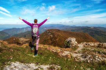 Girl hiker on top of the hill Klak in Slovakia