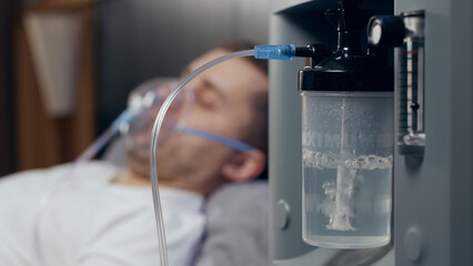 Working oxygen humidifier for nasal cannula, closeup oxygen generator, low oxygen saturation,...