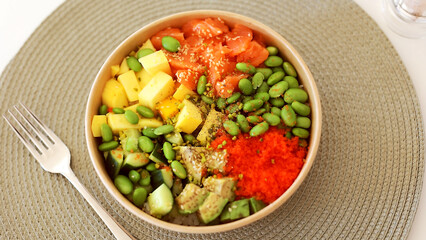 Traditional Hawaiian poke salmon dish in a cardboard box
