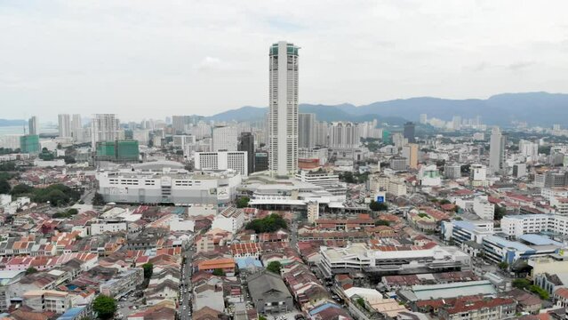 Drone view of Komtar Buildings and colorful houses in George Town Malaysia 