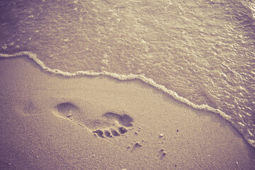 footprints on the beach