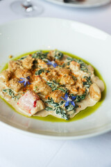 Potato gnocchi with crab meat and spinach