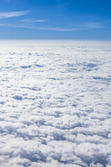 Fototapeta na wymiar Above The Clouds Photo of clouds and horizon