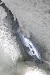 A deep Crevasse crack inside a glacier in alps