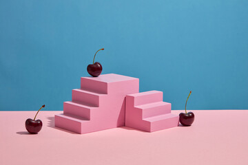 Blue background with blank space for product extracted from cherry presentation on pink stairway...