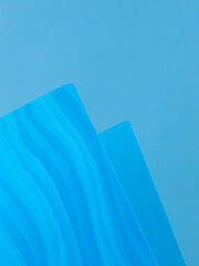 Close-up view of blue  plastic document folder on office table
