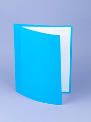Blue  plastic folder with documents and documents. maintaining contracts. isolated white copy space