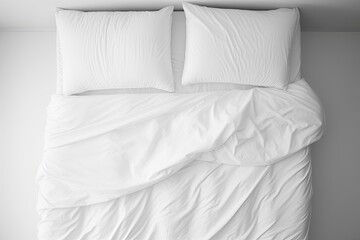Top view of an isolated white duvet cover in a bedroom.