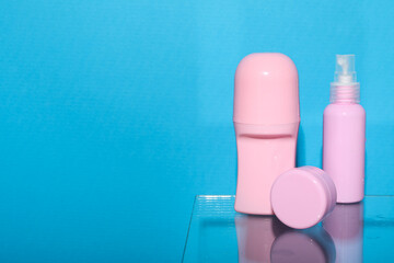Hygiene products on the shelf in the bathroom.