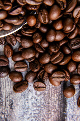 Top close up shot of coffee beans in portrait orientation.