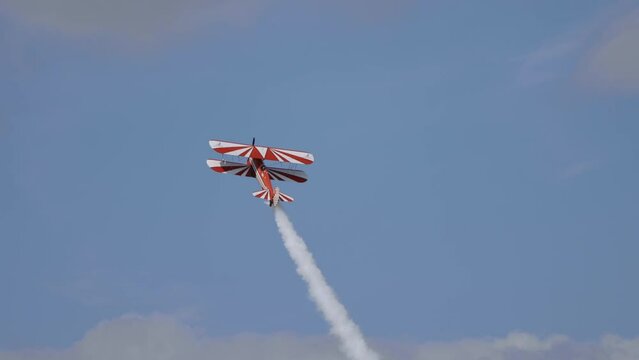 biplane Performs Aerobatics Figures. airshow 