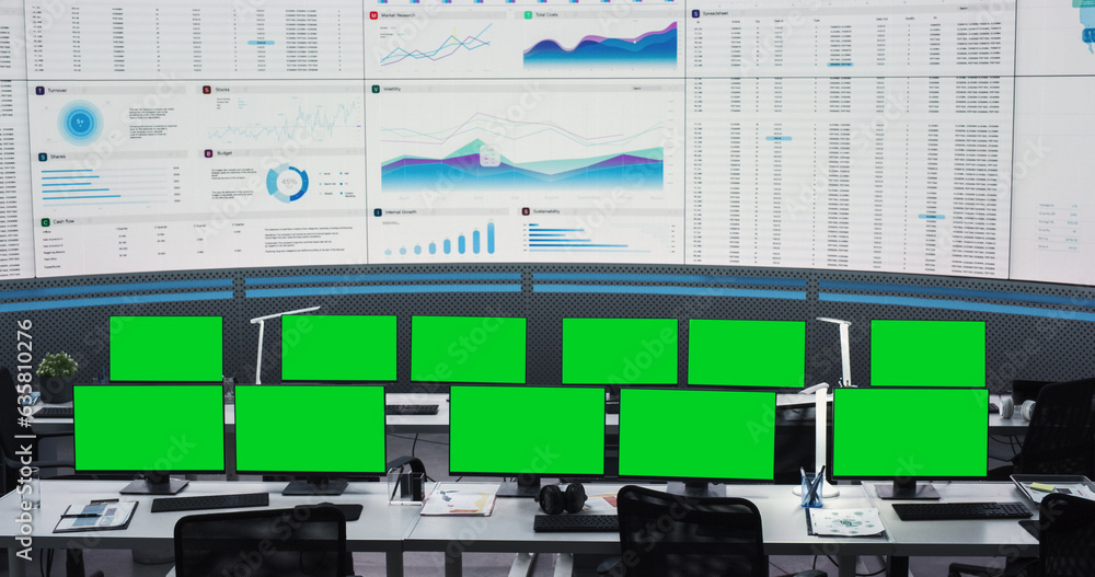 Poster Empty Monitoring Office With Green Screen Chromakey Desktop Computer Monitors Of Employees. Big Digital Screens Showing Graphs And Charts. Mockup Template Of Successful Financial Analytics Company.