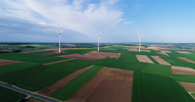 Wind generator. Wind generators in agricultural fields. Wind power generators. Wind power generators. Renewable electricity.
