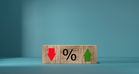 Interest rate financial and mortgage rates concept. Wooden cube block with icon percentage symbol...